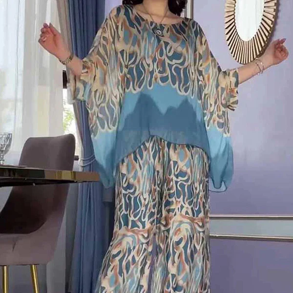 Women MAGNUM Printed loose top and pants set - Image 3