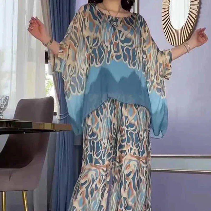 Women MAGNUM Printed loose top and pants set - Image 11